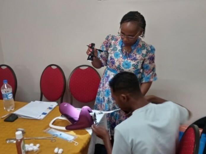A trainer supporting a participant on insertion of post-partum intra-uterine device (PPIUD)/photo credit: LSTM Kenya A trainer supporting a participant on insertion of post-partum intra-uterine device (PPIUD)/photo credit: LSTM Kenya